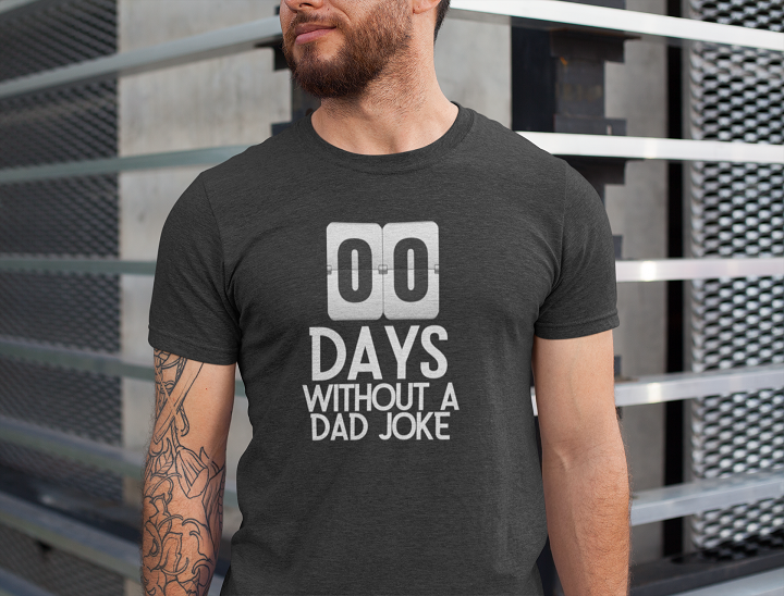 bearded man wearing a black tshirt with the words 00 days without a dad joke