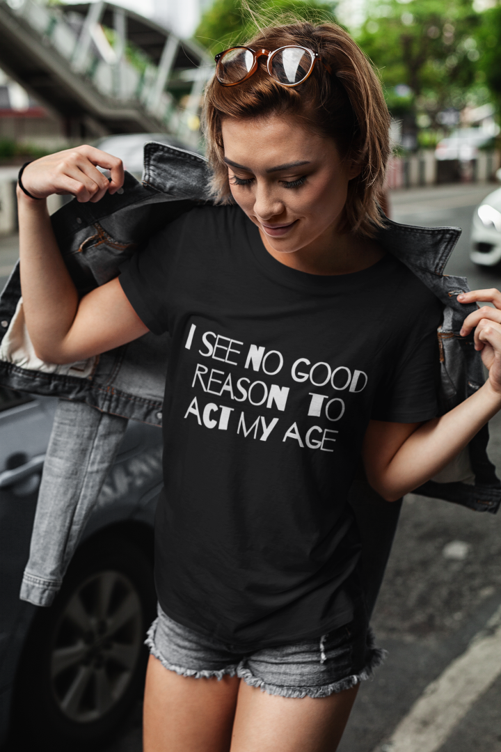 model is wearing a black t shirt that says i see no good reason to act my age