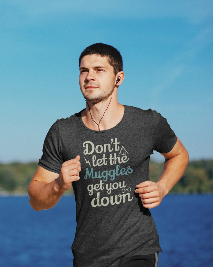 running model wears a black t shirt with the words don't let the muggles get you down