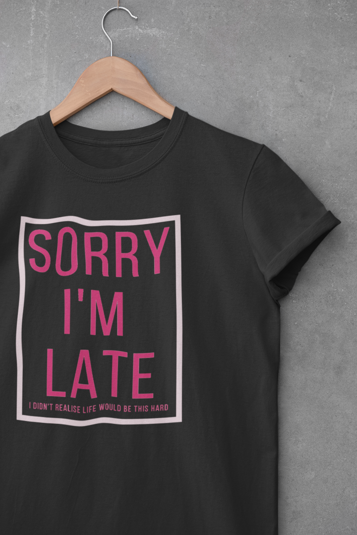 a black shirt that says Sorry I'm late I didn't know life would be this hard