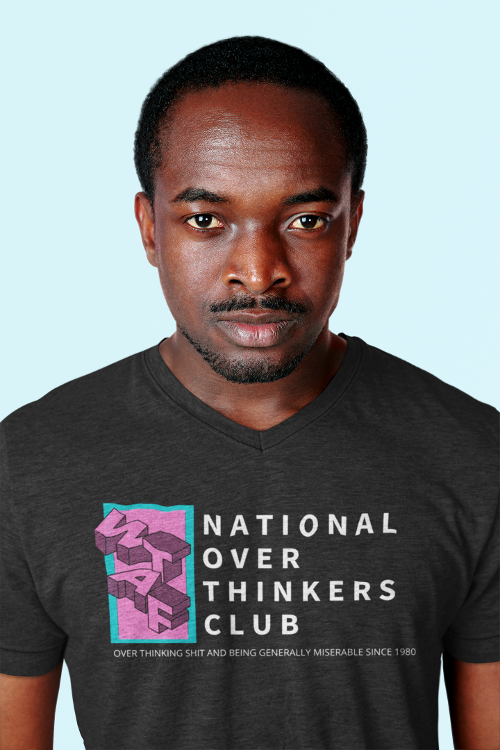 model wears a black t shirt featuring a WATF graphic and the words National Over Thinkers Club