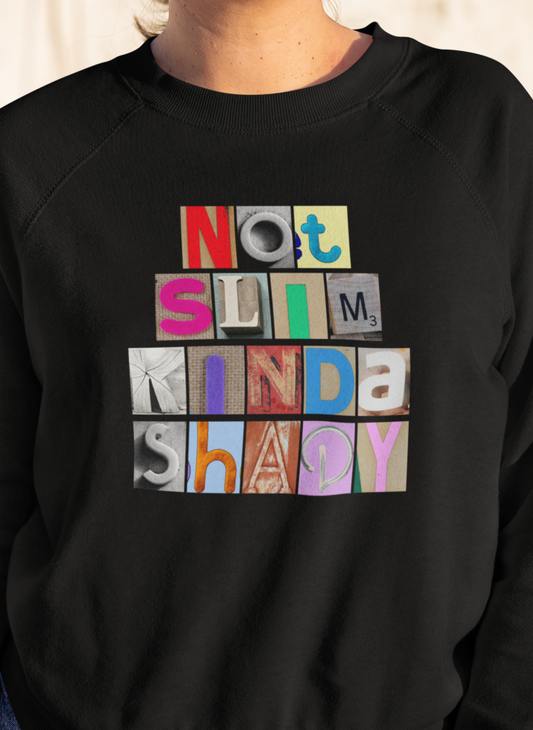 model is wearing a black sweatshirt that has letters spelling out the words not slim kinda shady