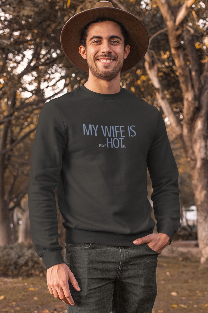 model is wearing a black sweater with the words my wife is psycHOTic