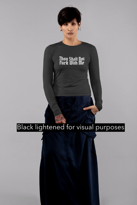 model is wearing a long sleeve t shirt with the words though shalt not fuck with me