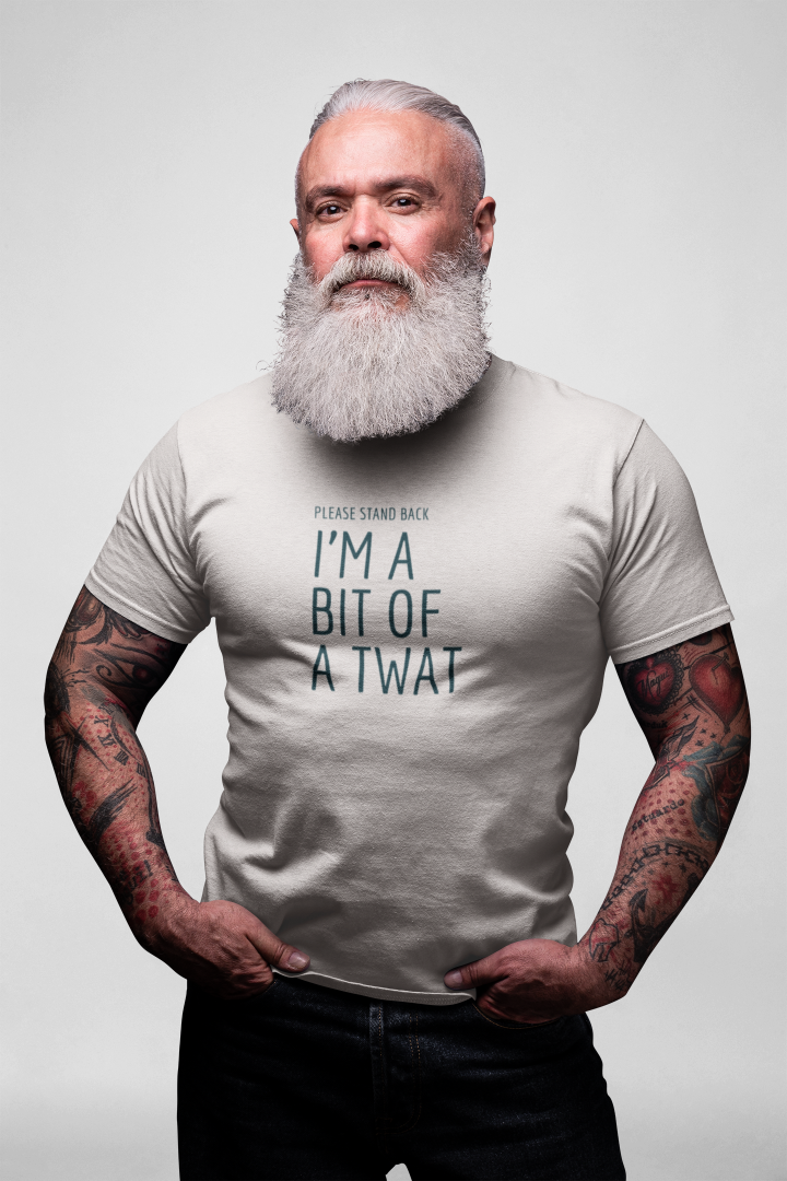 bearded model wearing a white t shirt that says please stand back I'm a bit of a twat